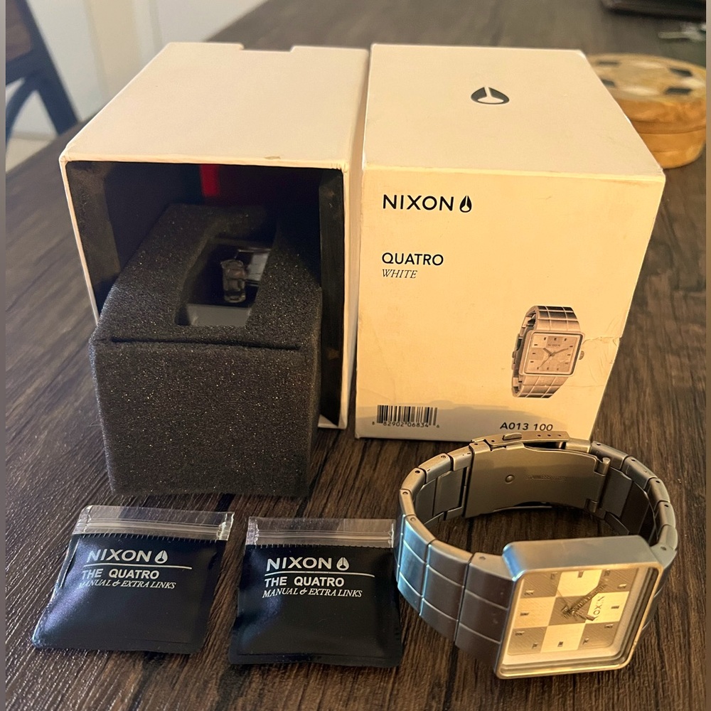 Nixon “Quatro” white watch